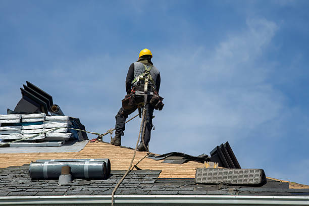Professional Roofing technician working in Parishville, NY